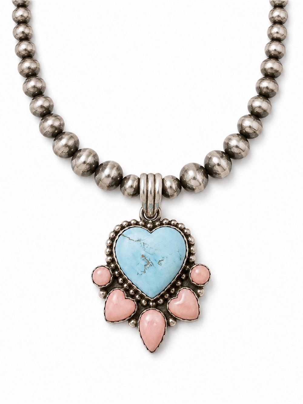 🌵Pendant Only🌵
Golden Hills Heart with Pink Conch surrounding the heart